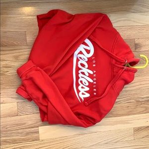 Young and Reckless red cropped hoodie